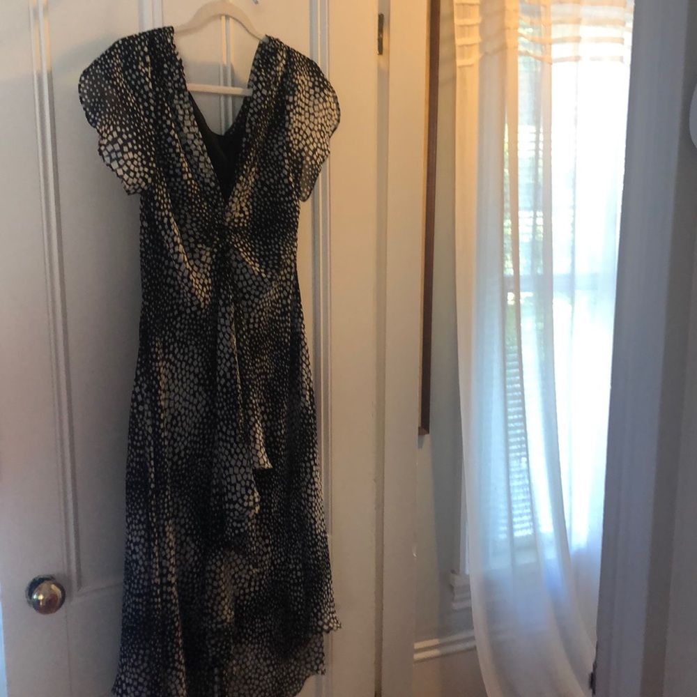 SL Fashions size 16 flattering, flutter sleeves